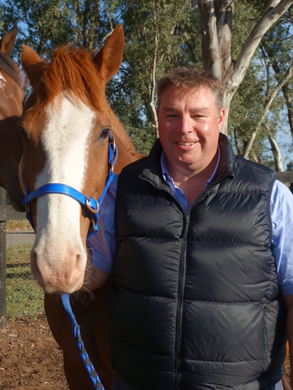 Profile of Dr Paul Robinson with horses